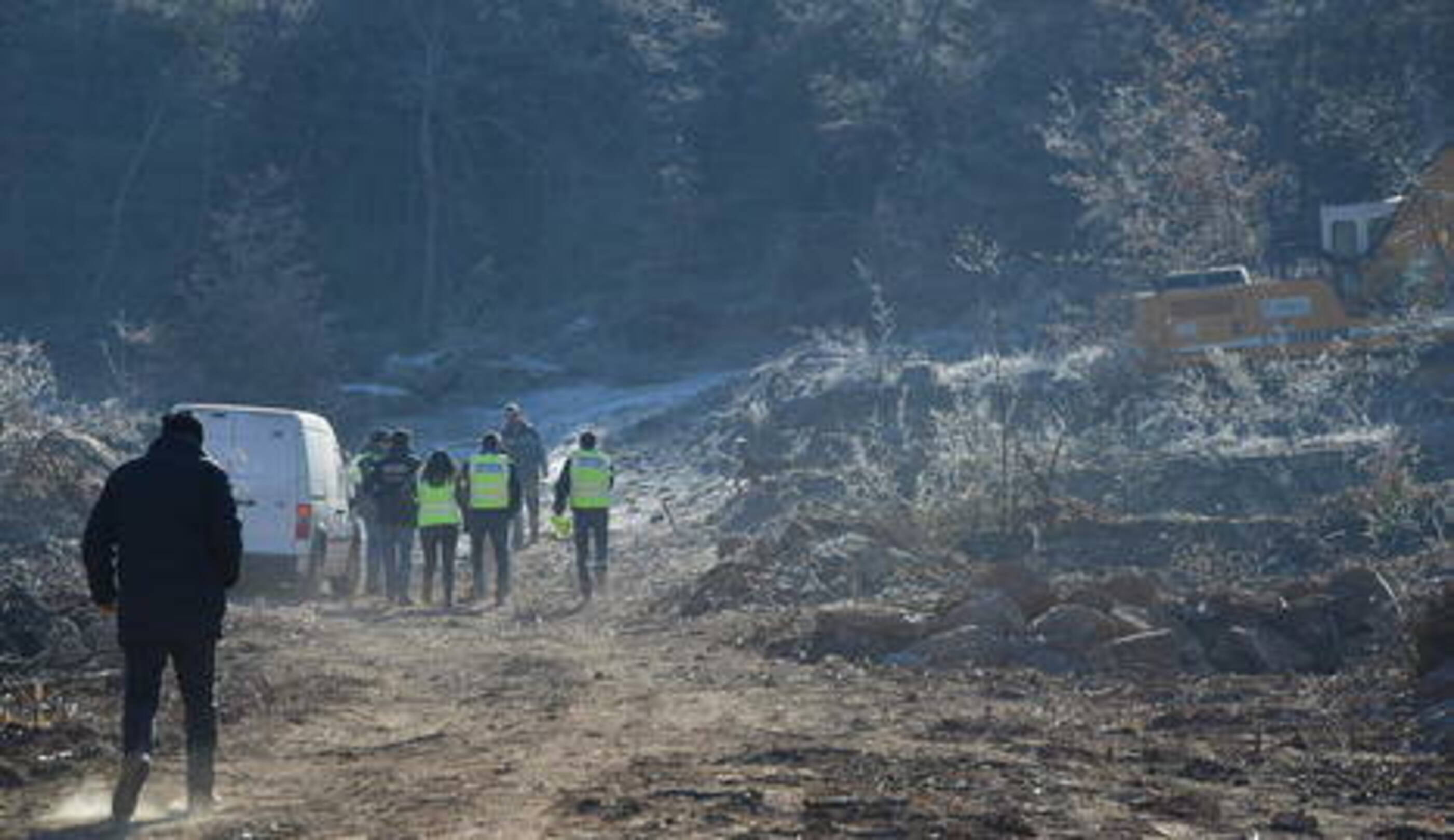 Investigadors dels mossos al lloc dels fets hores després del crim.