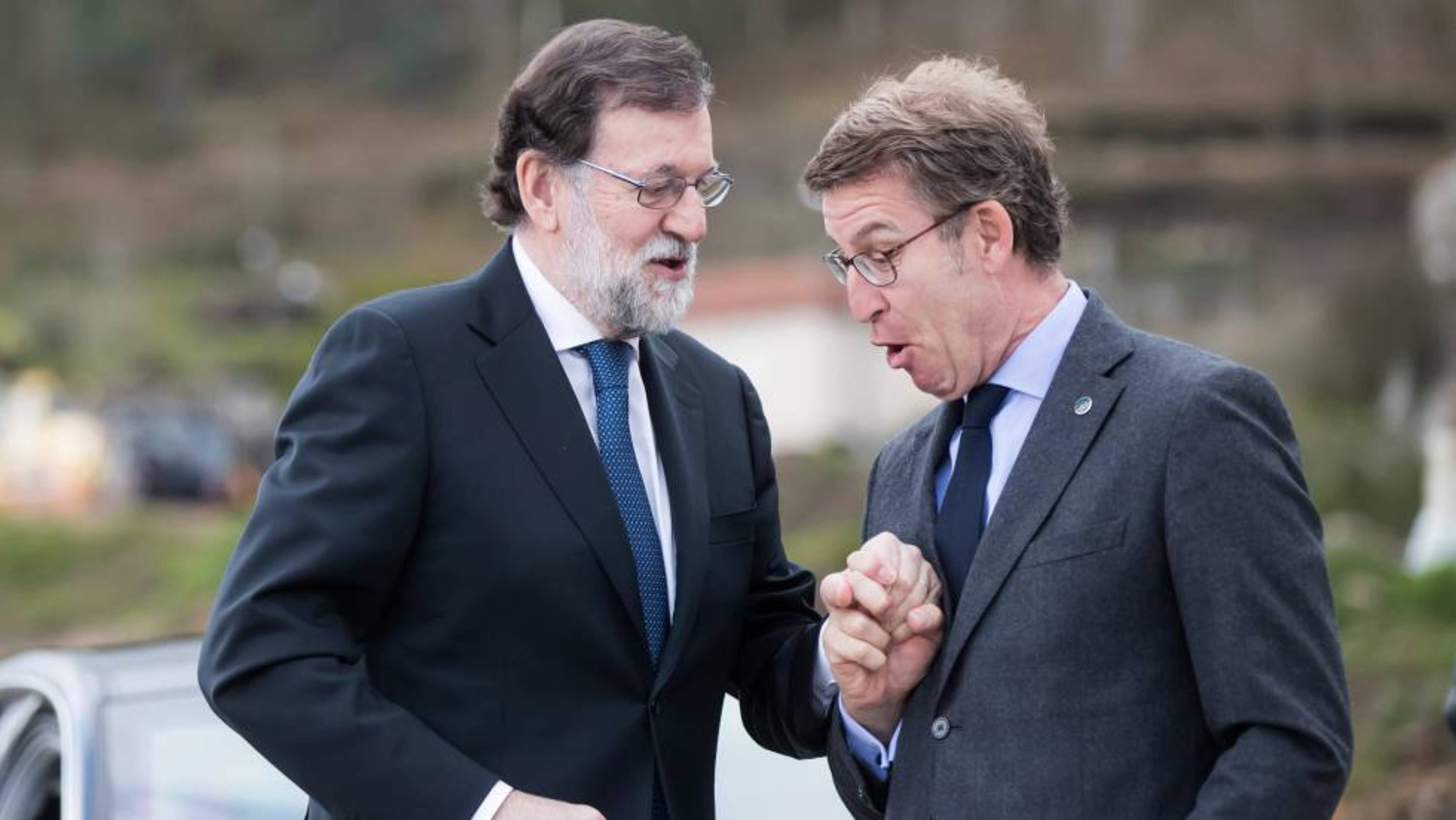 Mariano Rajoy i Alberto Núñez Feijoo, passat i present del PP.