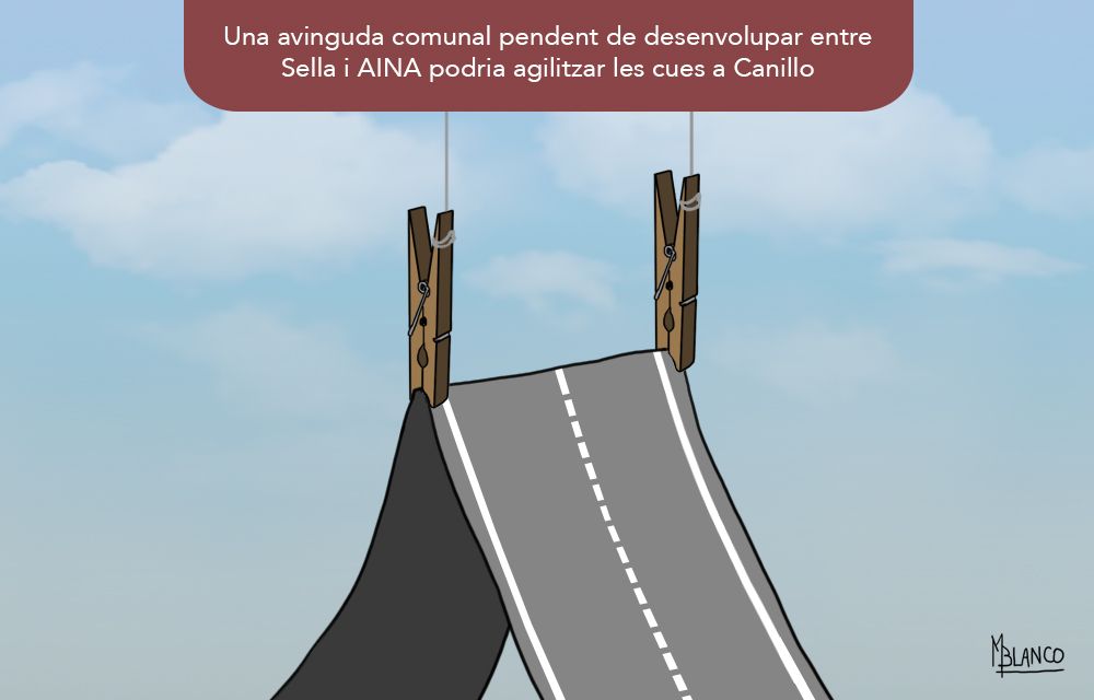 Vial agafat amb pinces.