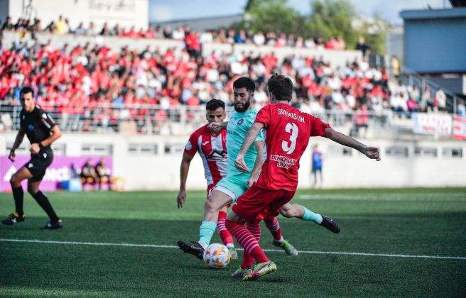 Un moment del partit. 