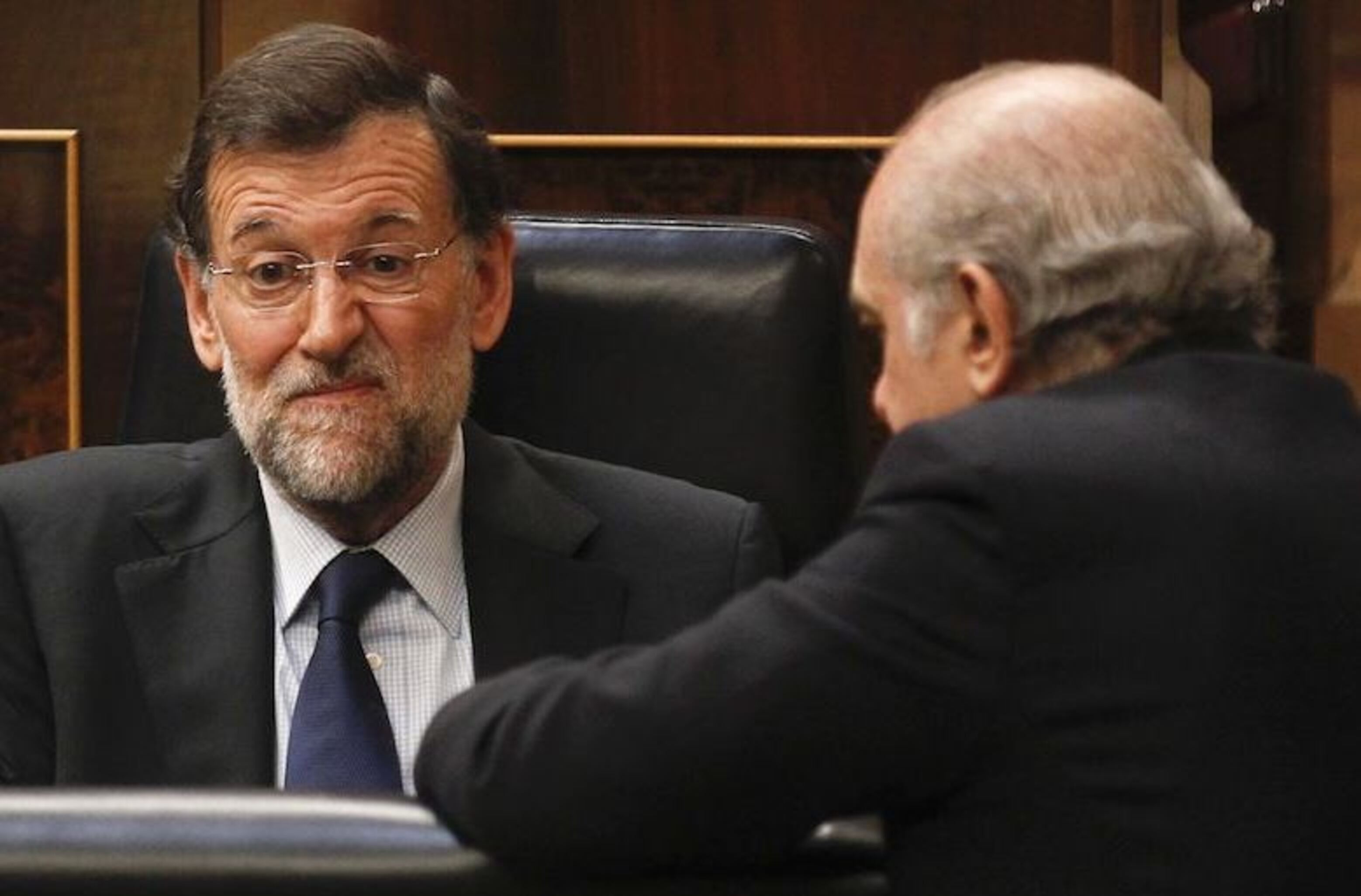 Mariano Rajoy i Jorge Fernández Díaz conversant al Congrés.