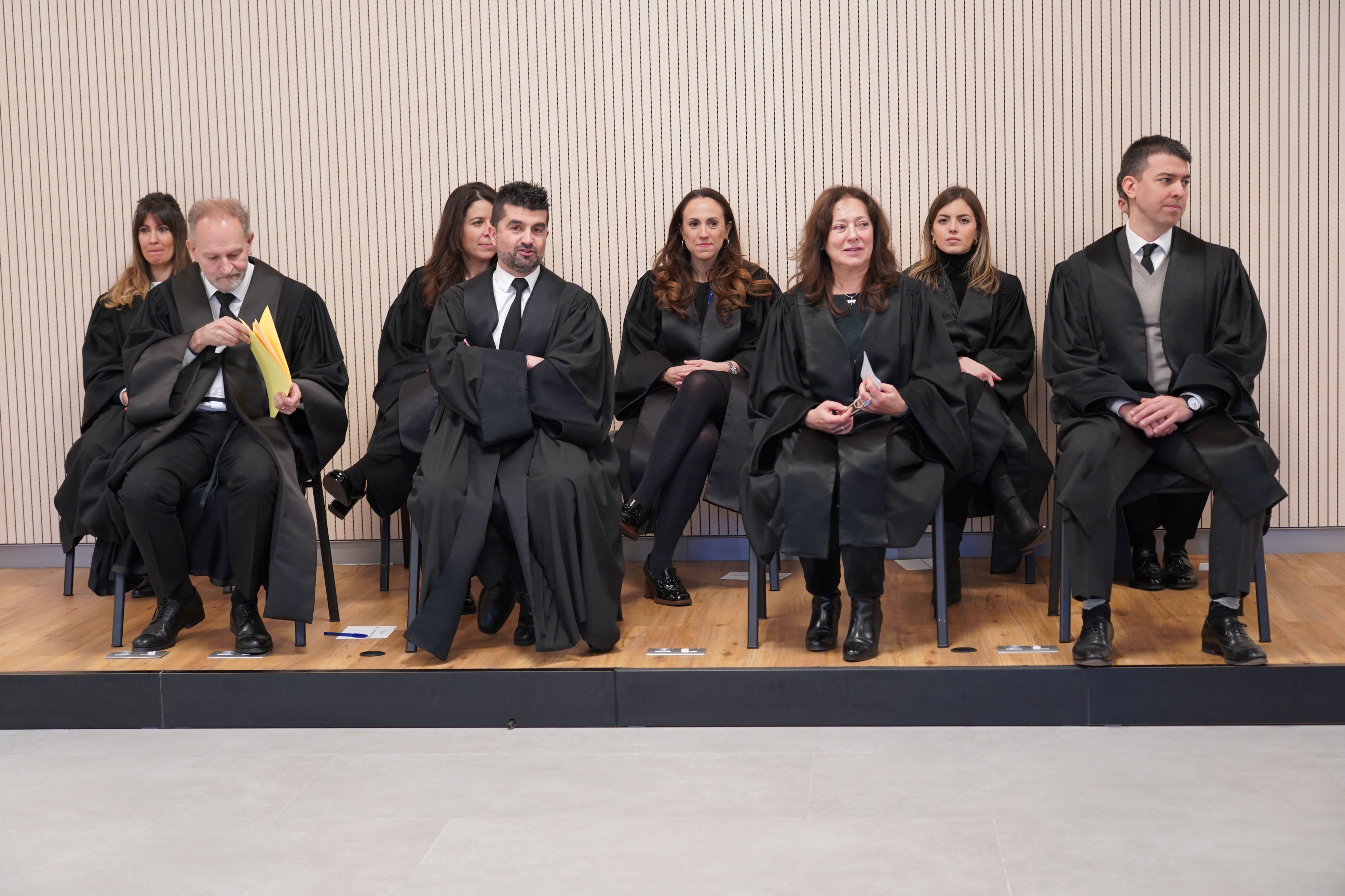 El fiscal general, a davant i a l'esquerra, juntament amb els vuit fiscals adjunts.