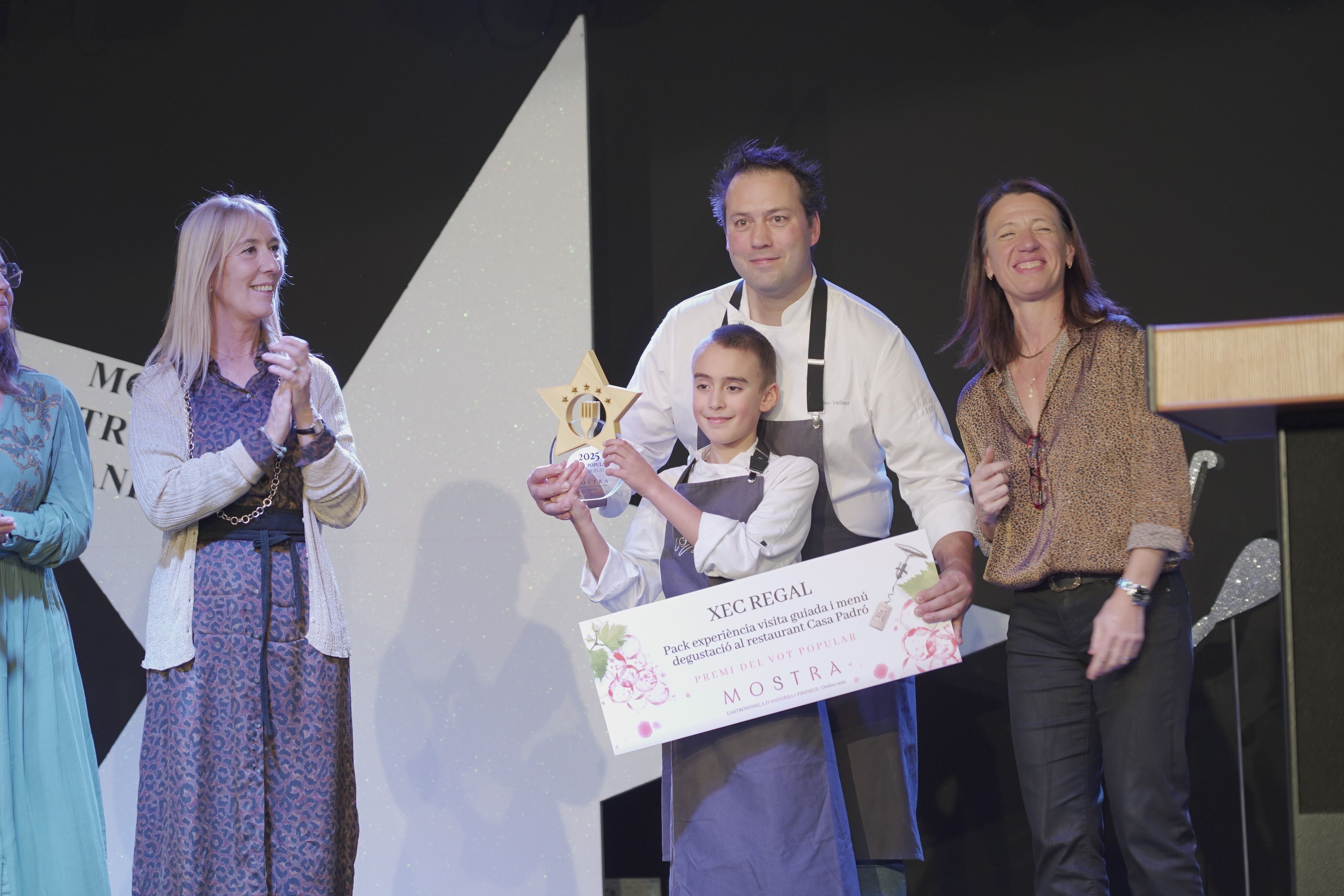 Pare i fill de l'Hostal Palanques de la Massana, guanyadors. 