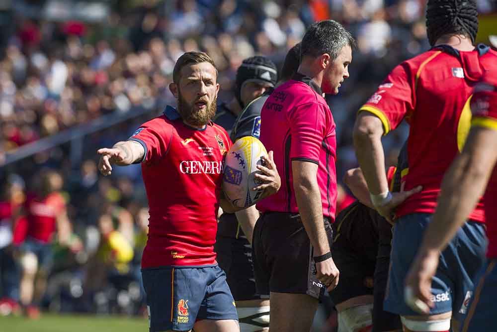 Mélé amb la selecció espanyola.