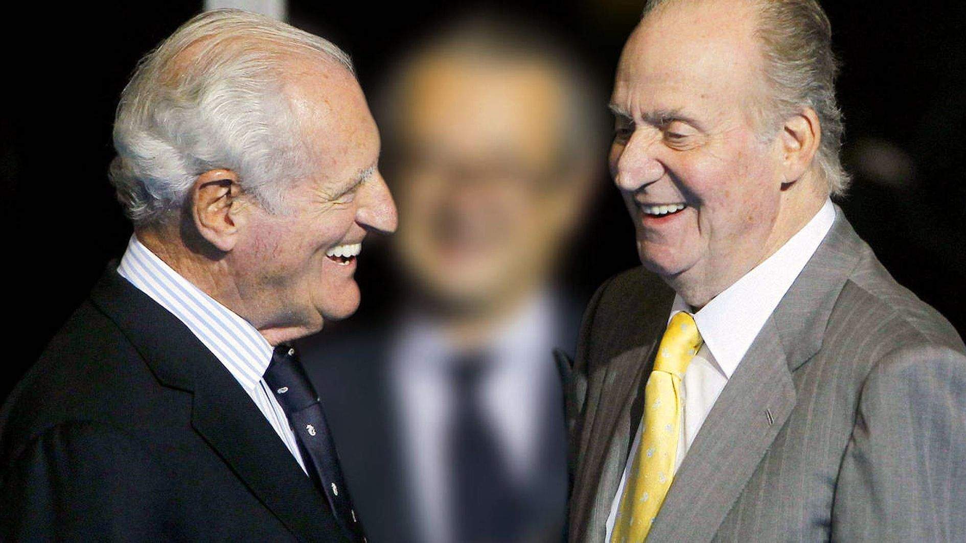 Josep Cusí i Joan Carles de Borbó somrients.