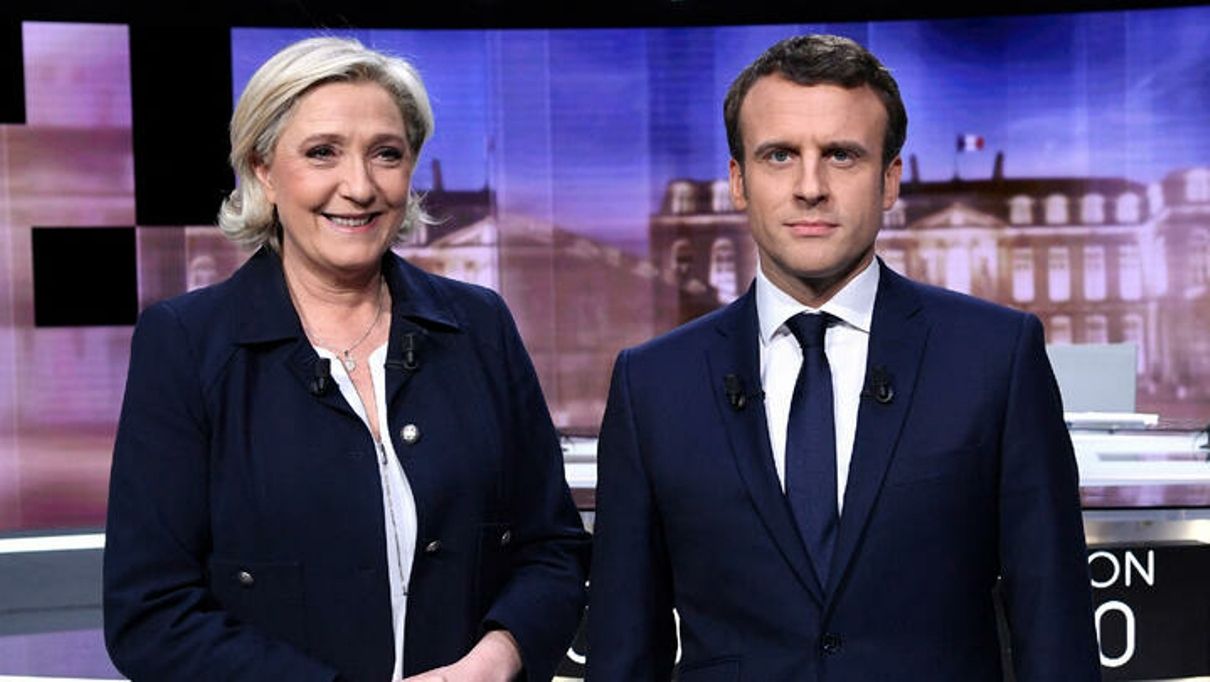 Marine Le Pen i Emmanuel Macron abans d'un debat l'any 2017.